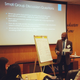 Sharif Durhams, a homepage editor at the Washington Post, reports to the Unity Diversity Caucus on a discussion of how to protect journalists from attacks in the field and online. (Nicki Mayo/Twitter)